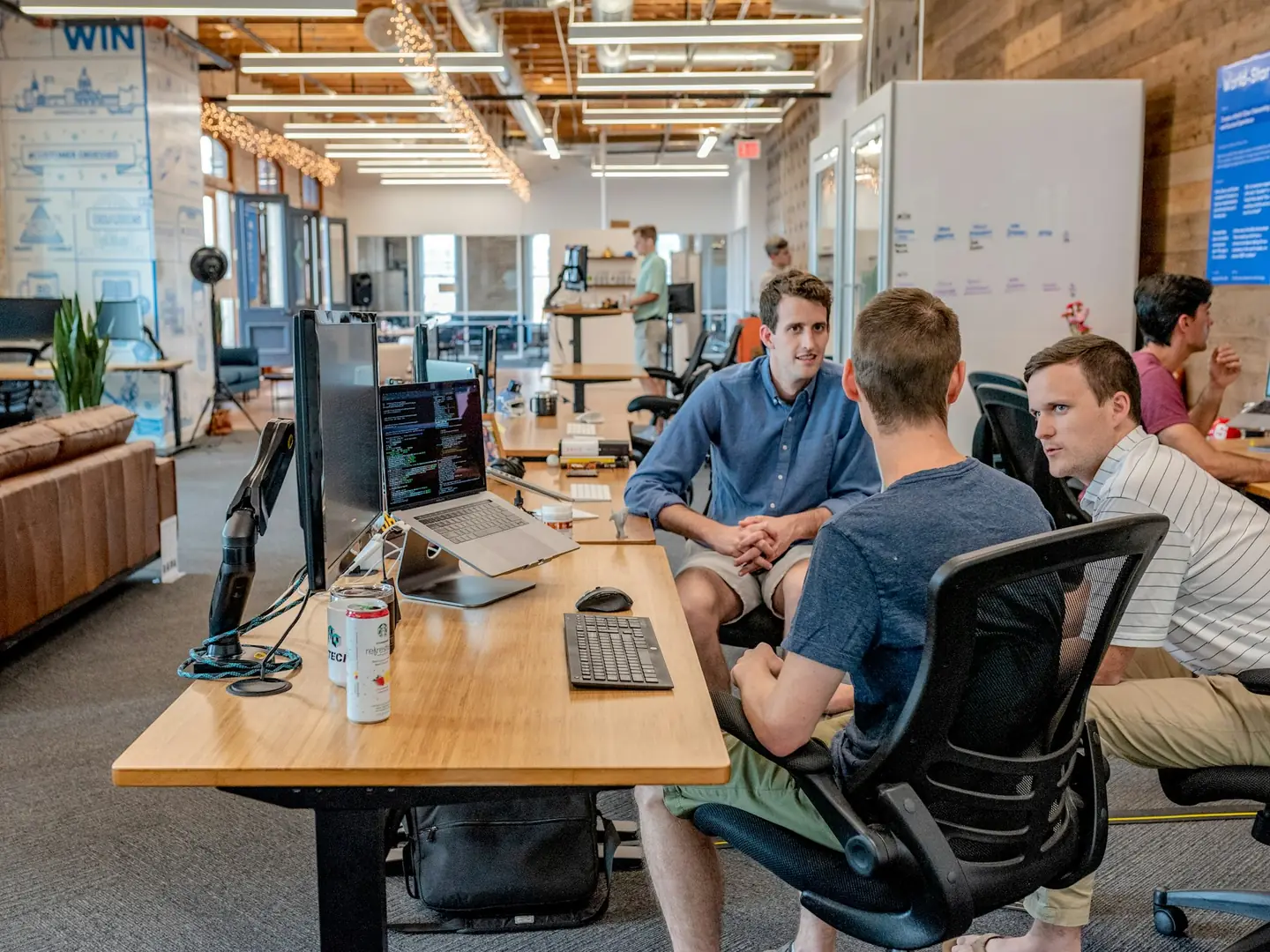 Creative team collaborating in an open workspace